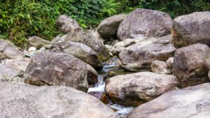 A little river flowing between rocky path at Suntaley Khola - Abokash images